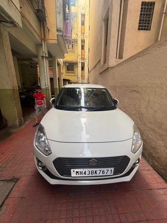 White Maruti Suzuki Swift automatic self drive car on rent in Ravet